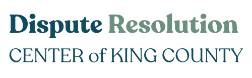 Logo for Dispute Resolution Center of King County, featuring the organization’s name in blue and green text on a light background