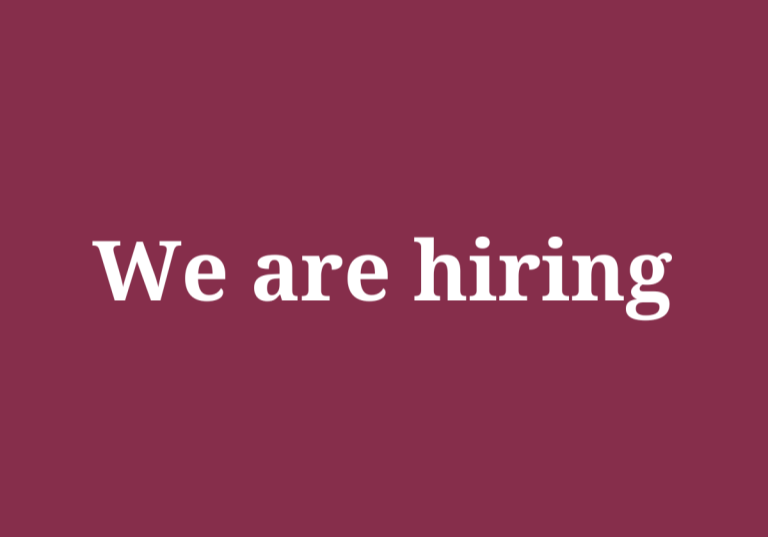 “We are hiring” text on a maroon background
